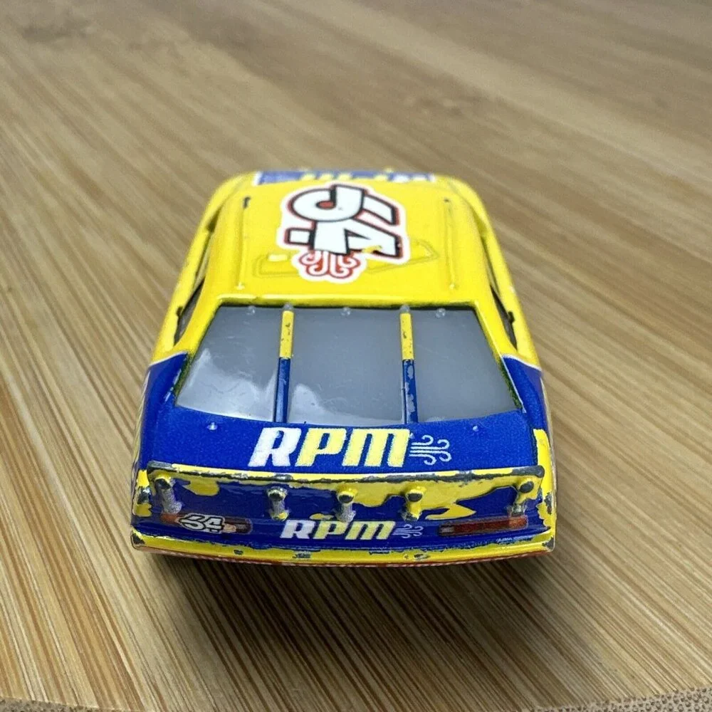 Disney Pixar Cars Diecast Mattel RPM #64 Yellow Blue Race Car‎ Rubber Tires